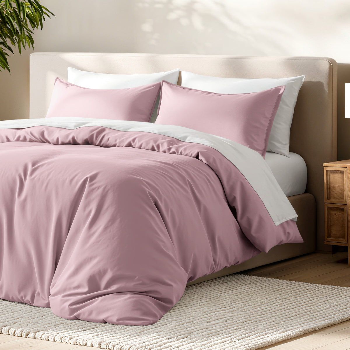 Bed with microfiber duvet cover and sham set in a bedroom setting.