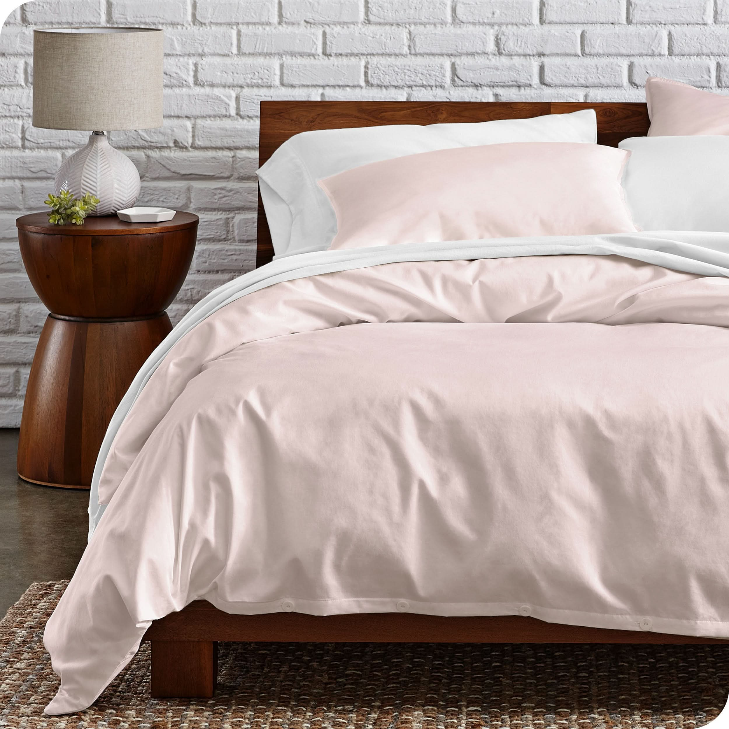 Percale duvet cover set on a bed in a modern bedroom