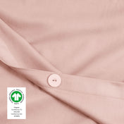 Close up of a button on the sateen duvet cover