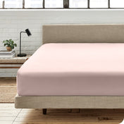 Modern bedroom with a fitted sheet which fits deep mattresses up to 15 inches