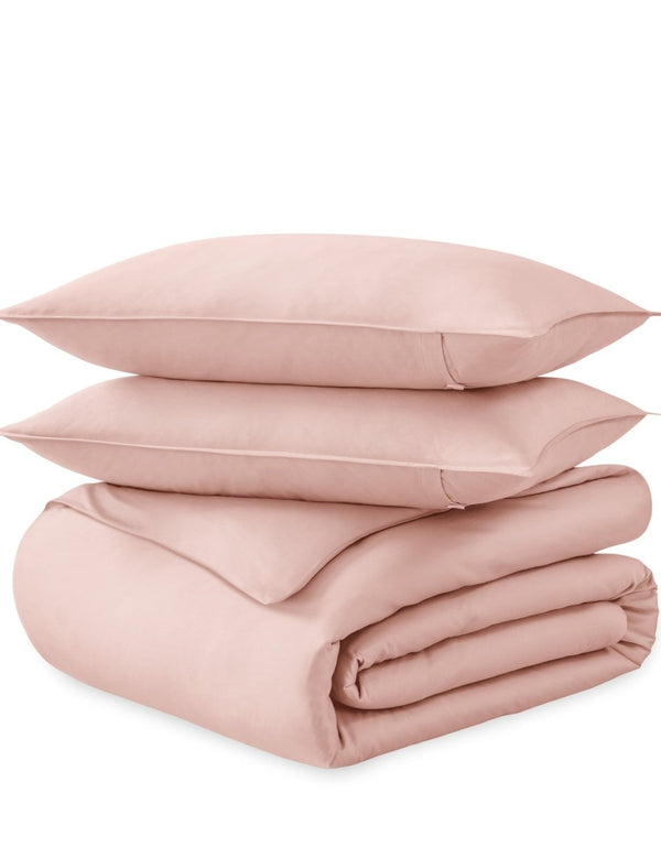 A sateen duvet set arranged in a stack