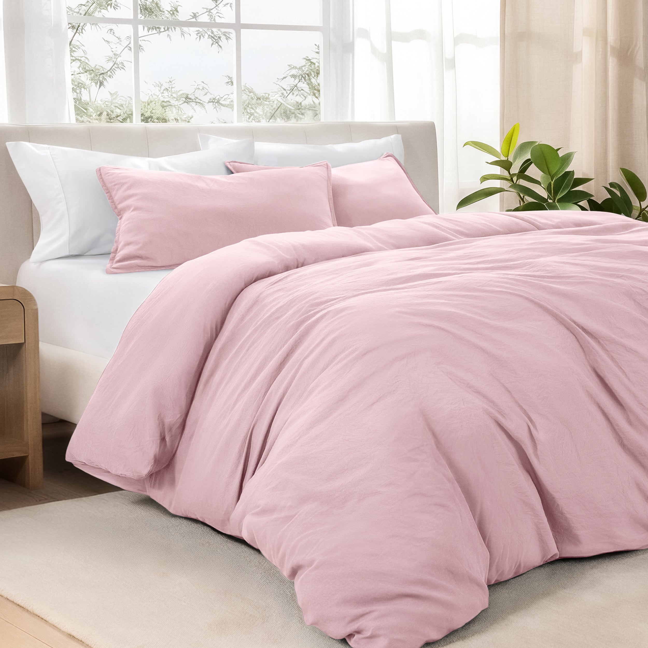Bedding set on a bed in a bright room with natural light