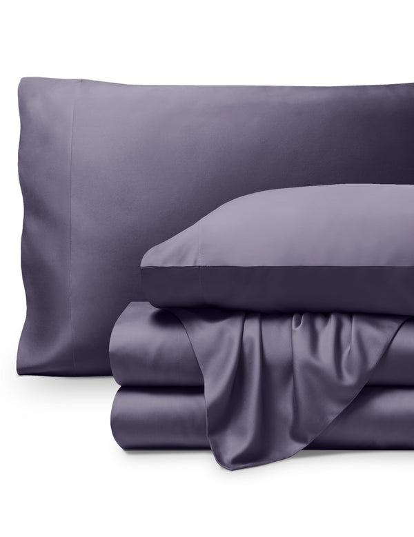Bamboo pillowcases and sheets set on a white background