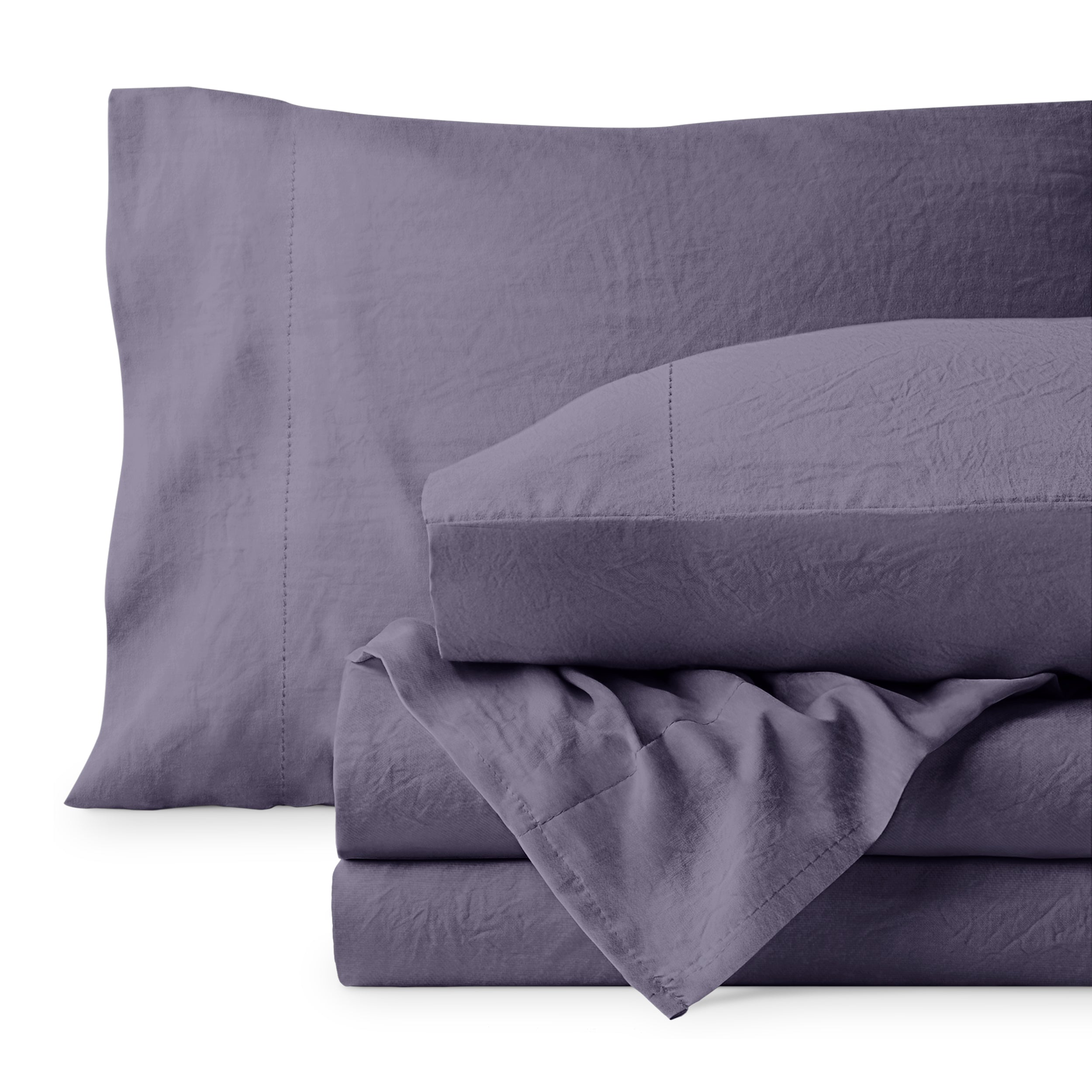 Washed microfiber sheet set folded and stacked on a white background