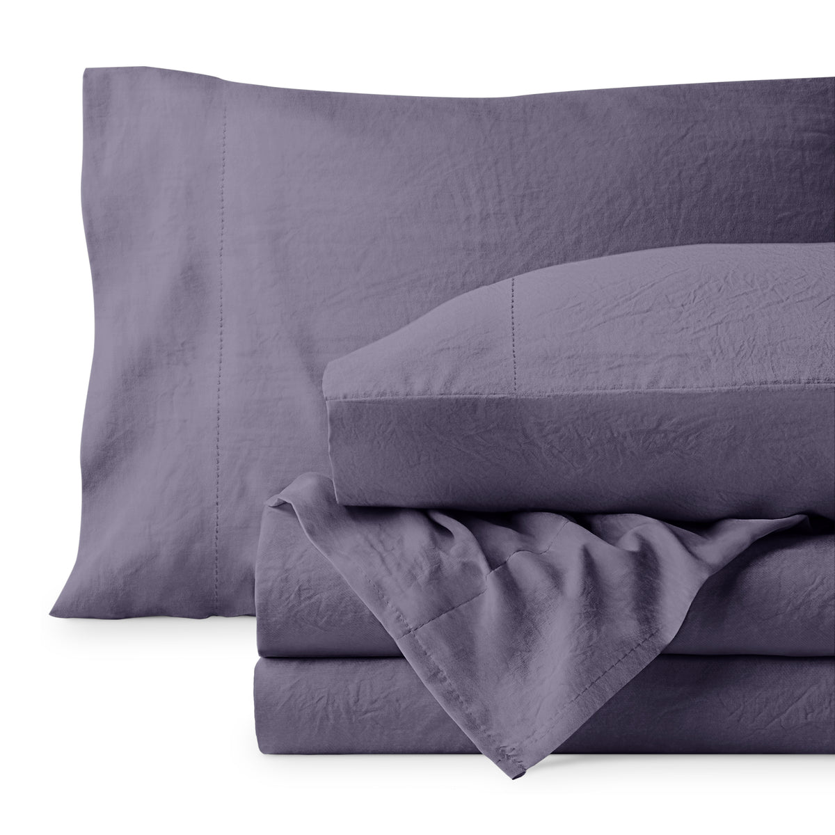 Washed microfiber sheet set folded and stacked on a white background