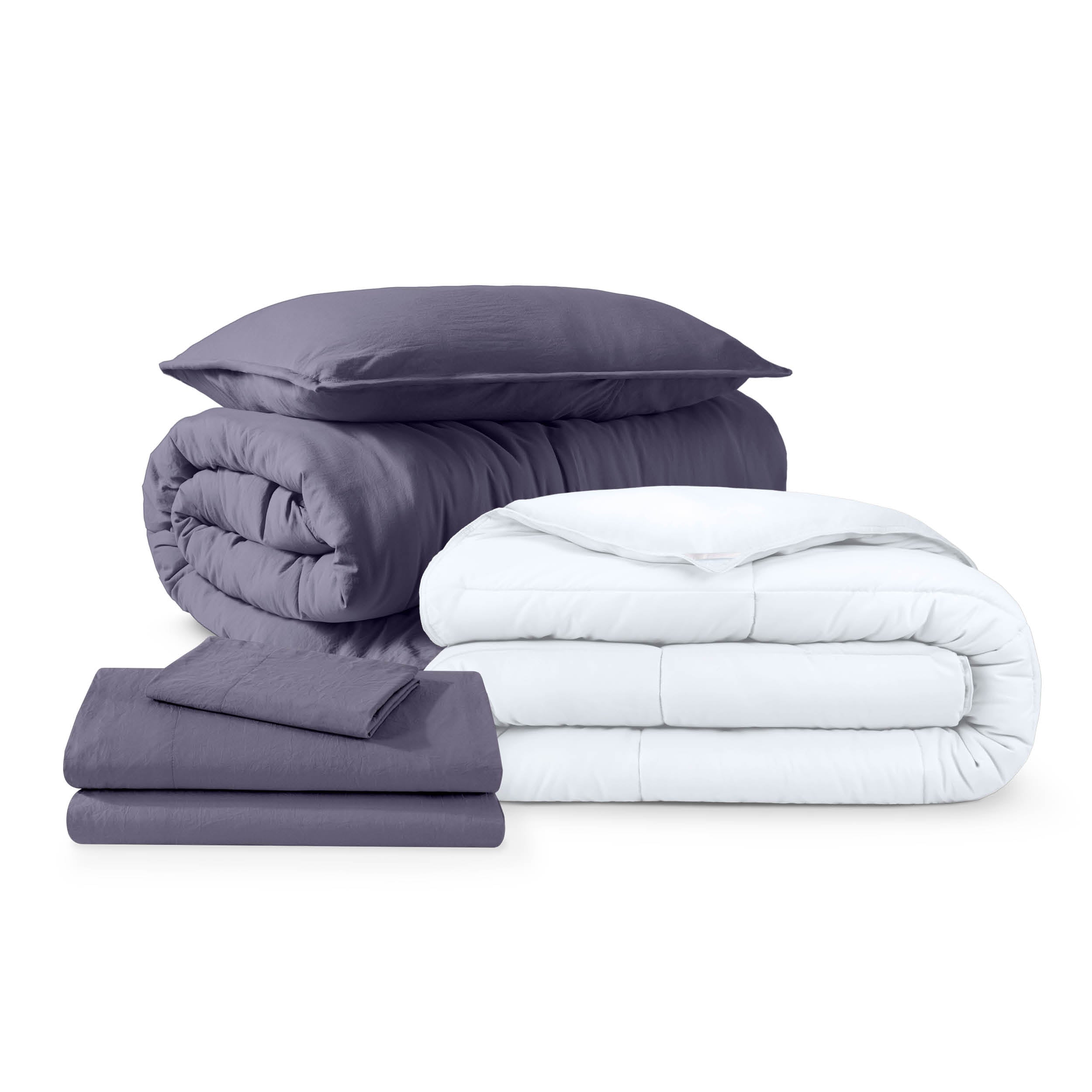 Bed with microfiber bedding and pillows in a bedroom setting