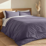 A bedroom with percale bedding