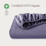 Certified GOTS Organic fitted sheet on a light gray background