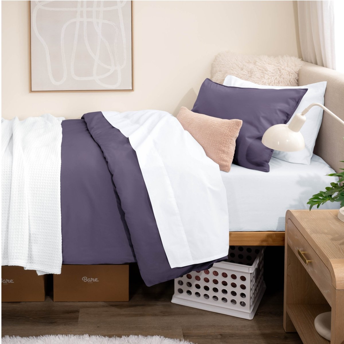 Bed with percale bedding in a dorm room setting