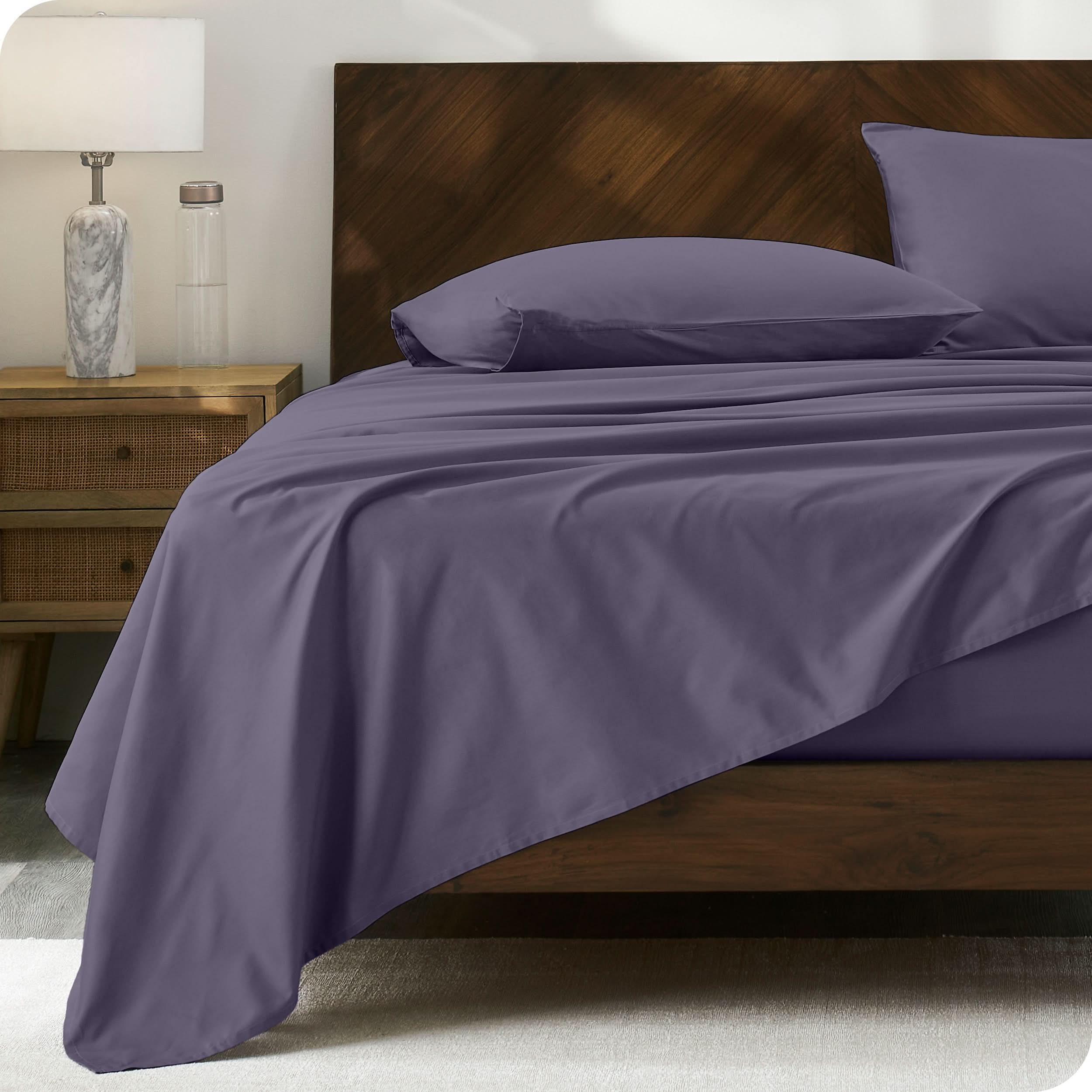 Modern wood bed made with percale sheet set