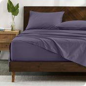 Modern wood bed made with percale sheet set