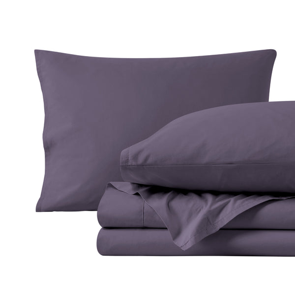 Percale sheets folded and matching pillowcases with pillows in them