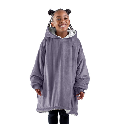 A child with a sherpa wearable blanket on