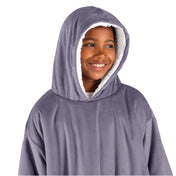 A child with a wearable blanket on