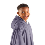 Close up of a sherpa wearable blanket on a child