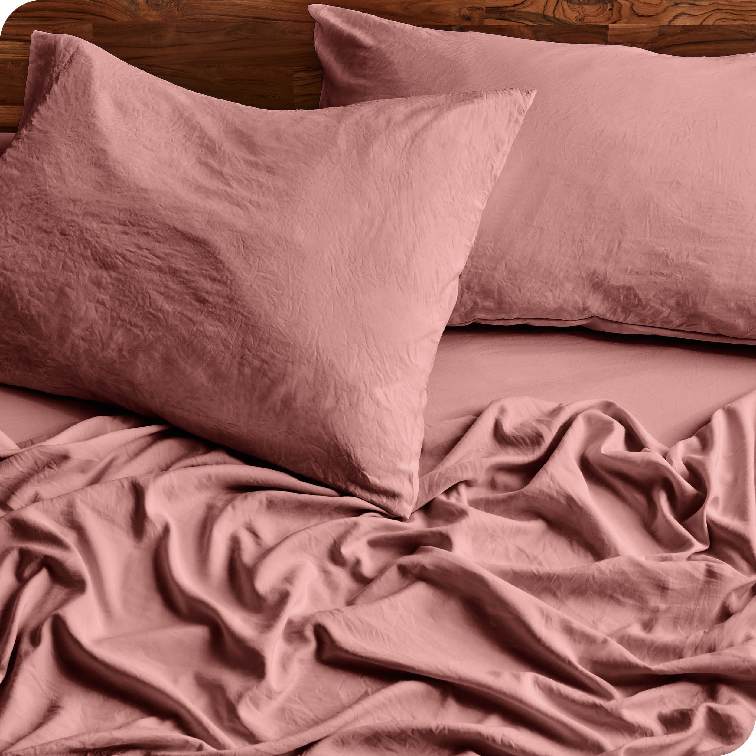 Close in view showing texture of sandwashed sheet set on the bed