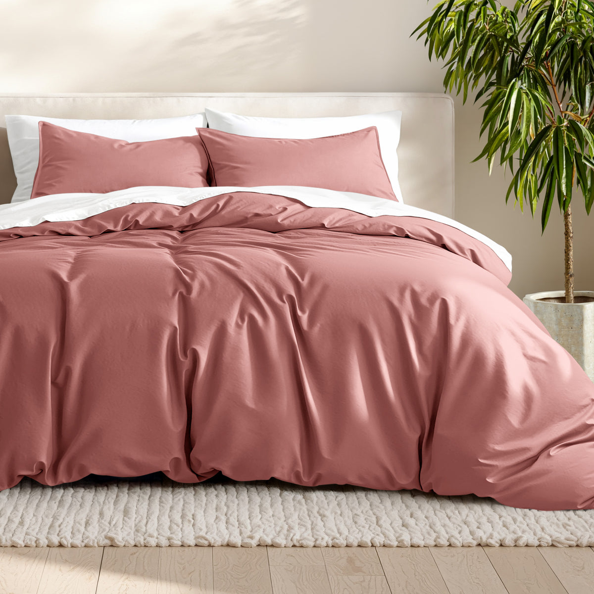 Microfiber bedding set on a bed with a neutral background