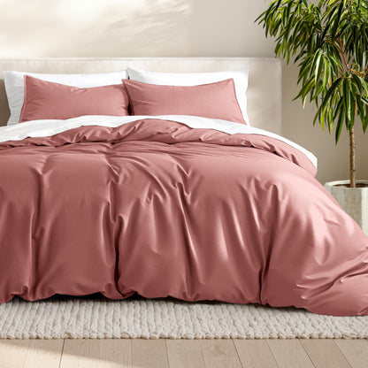 Microfiber bedding set on a bed with a neutral background