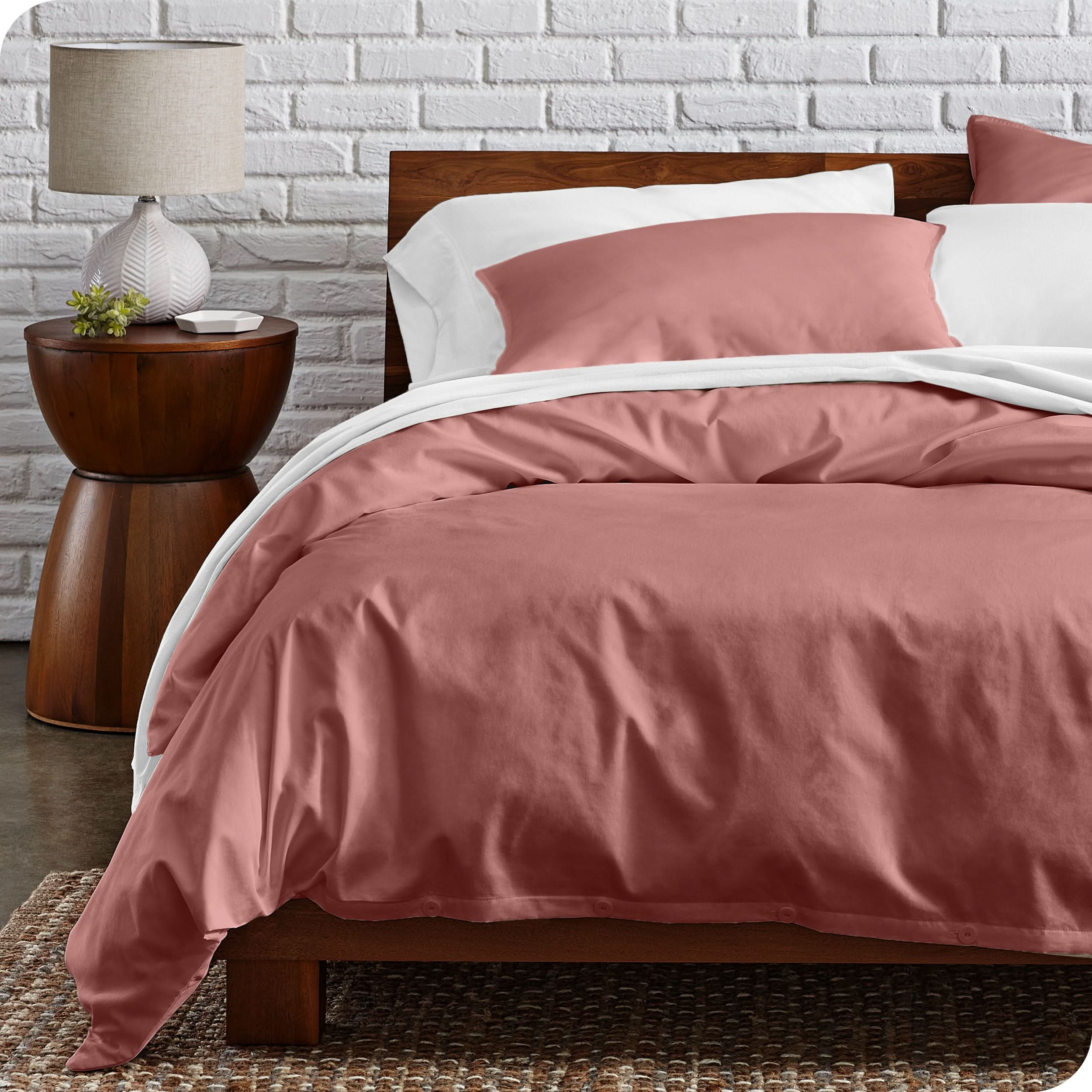 Percale duvet cover set on a bed in a modern bedroom