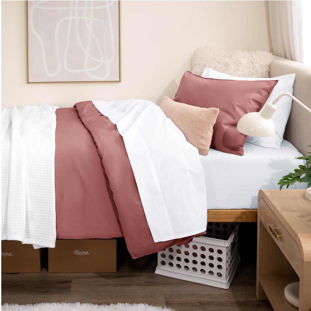 Bed with percale bedding in a dorm room setting