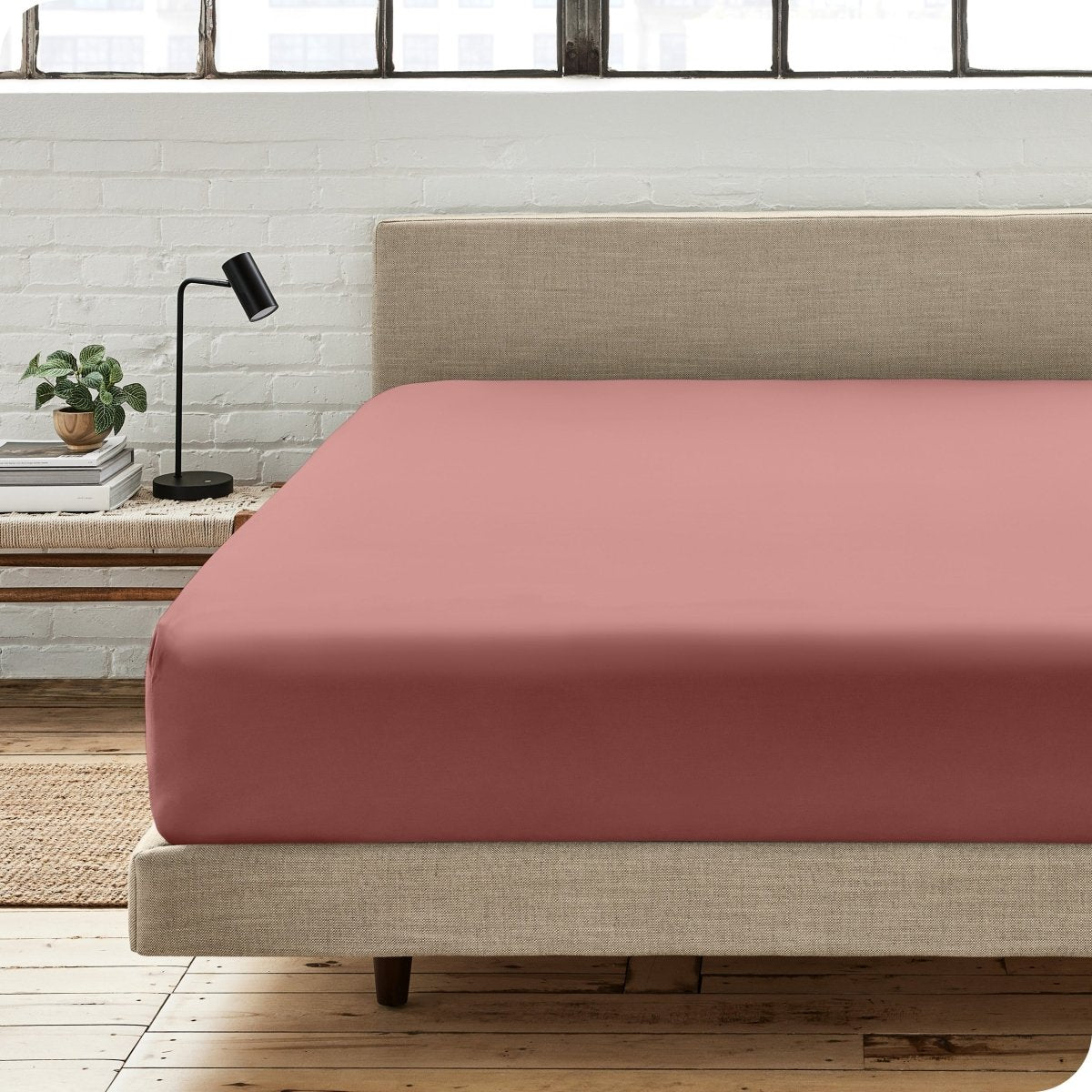 Modern bedroom with a fitted sheet which fits deep mattresses up to 15 inches