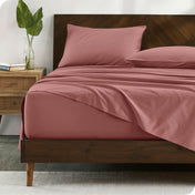 Modern wood bed made with percale sheet set