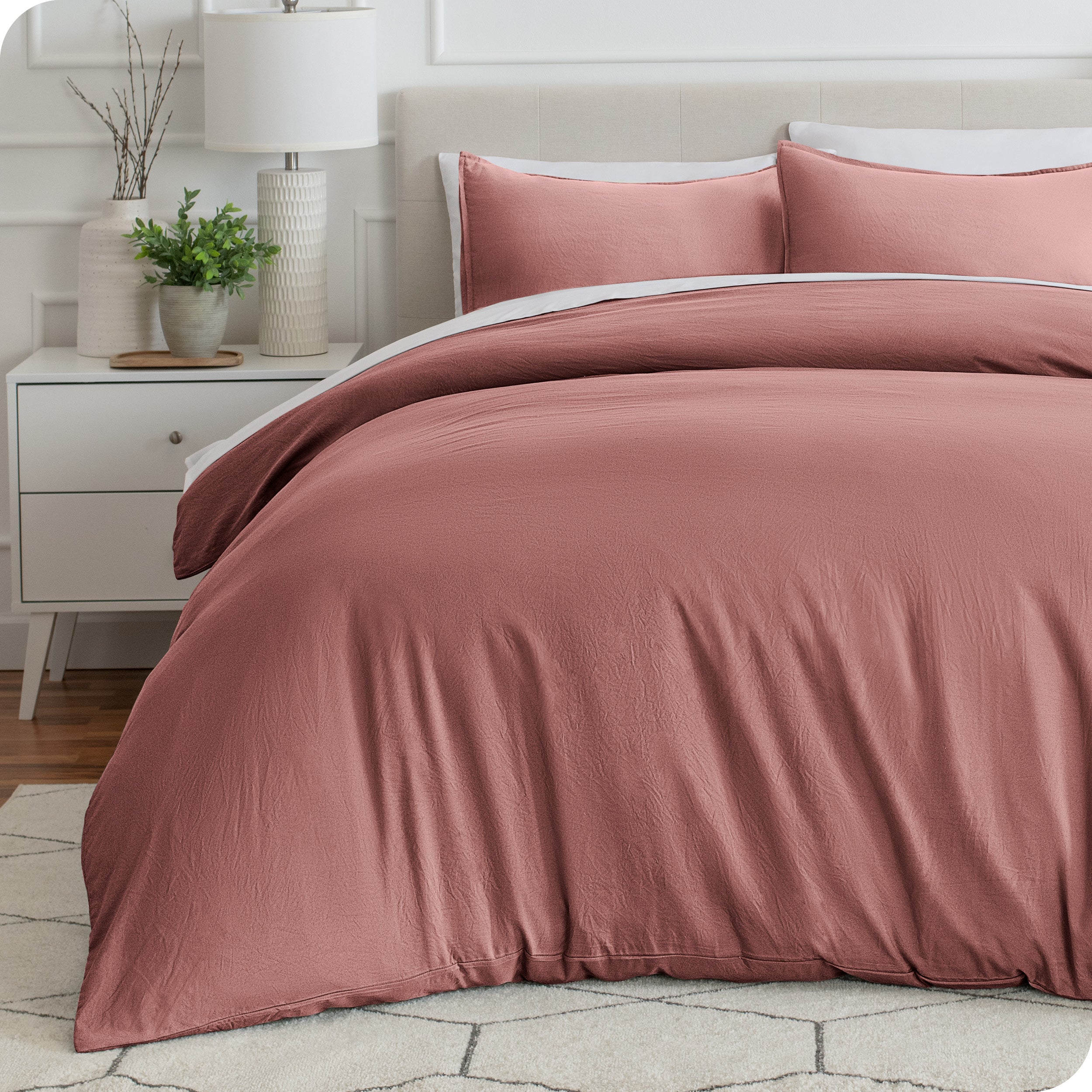 Relaxing room scene with Sandwashed duvet cover laid out over the bed