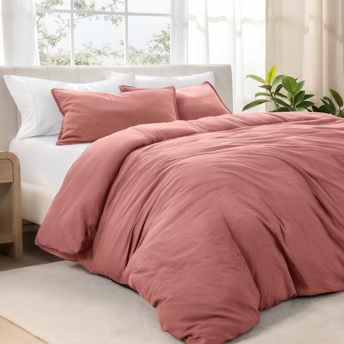 Bedding set on a bed in a bright room with natural light