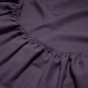 Close-up of a flannel fitted sheet with gathered elastic