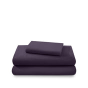 Cotton flannel sheet set folded and stacked on a white background