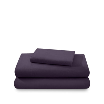 Cotton flannel sheet set folded and stacked on a white background