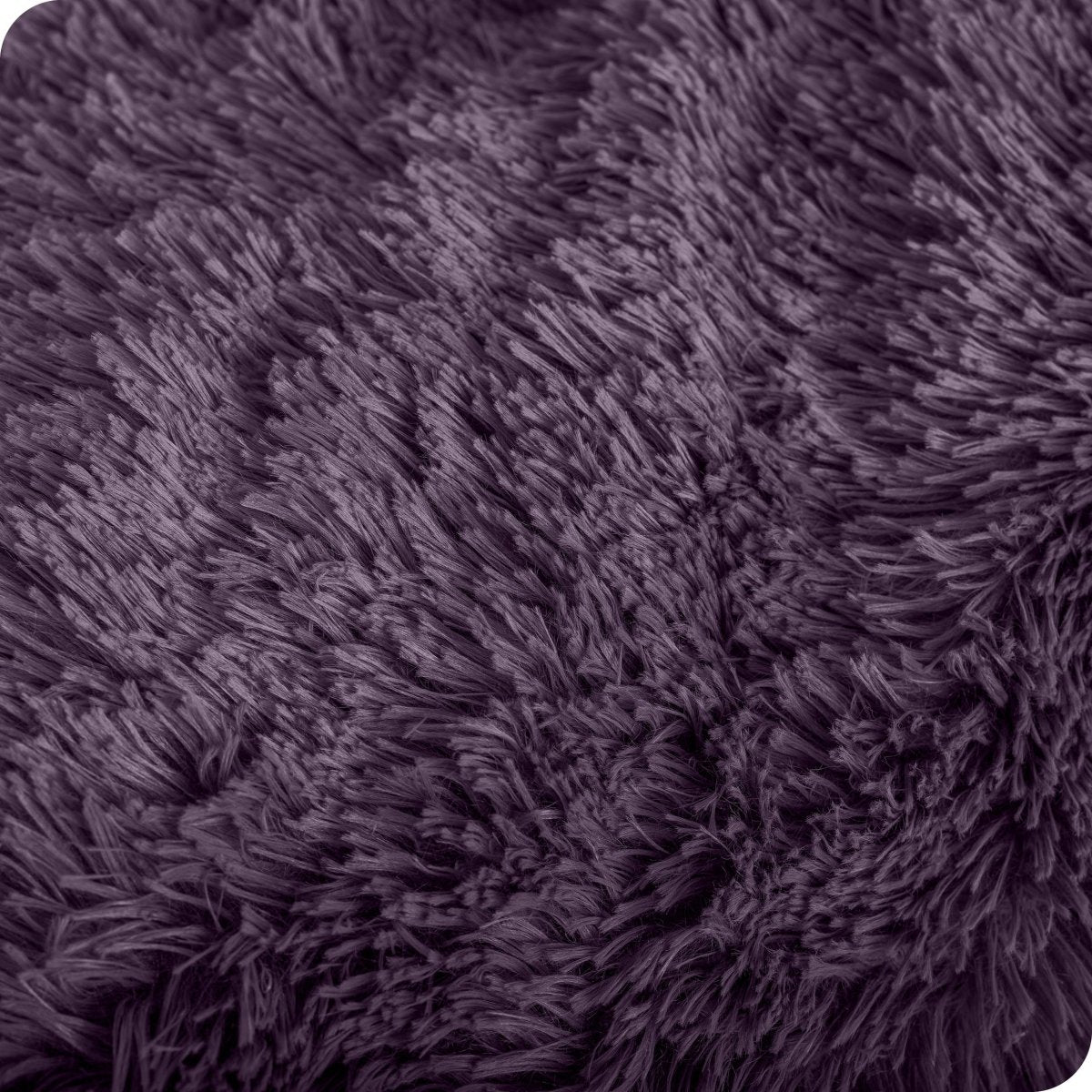 Close up of the soft texture of a shaggy faux fur sherpa blanket