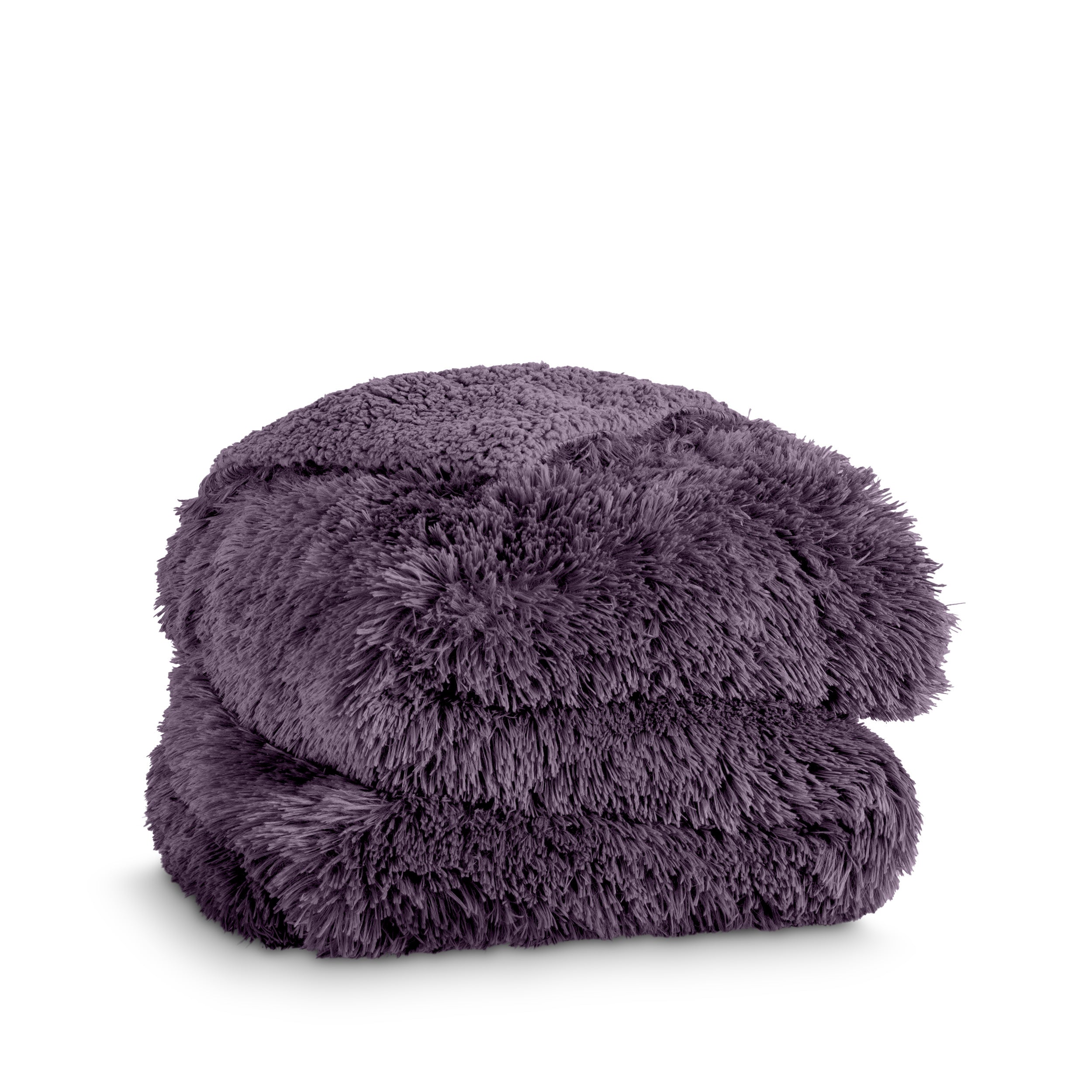 A shaggy faux fur blanket folded