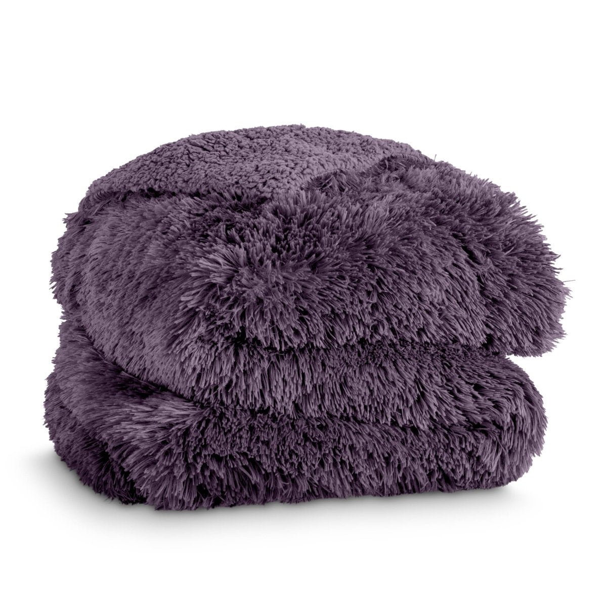 A shaggy faux fur blanket folded neatly