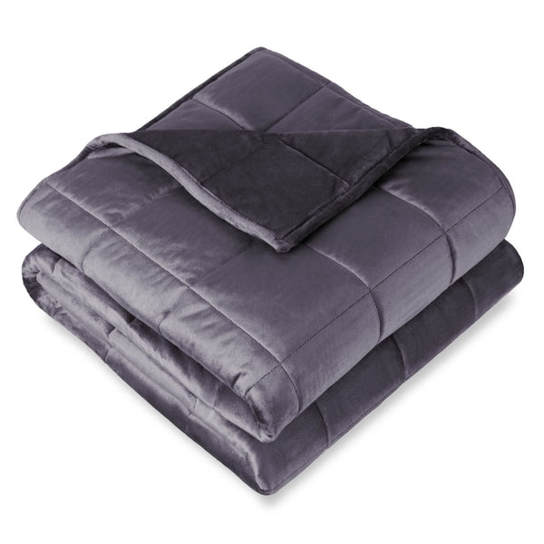 A folded minky weighted blanket with a white background
