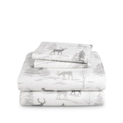 Stack of flannel sheets and pillowcases on a white background