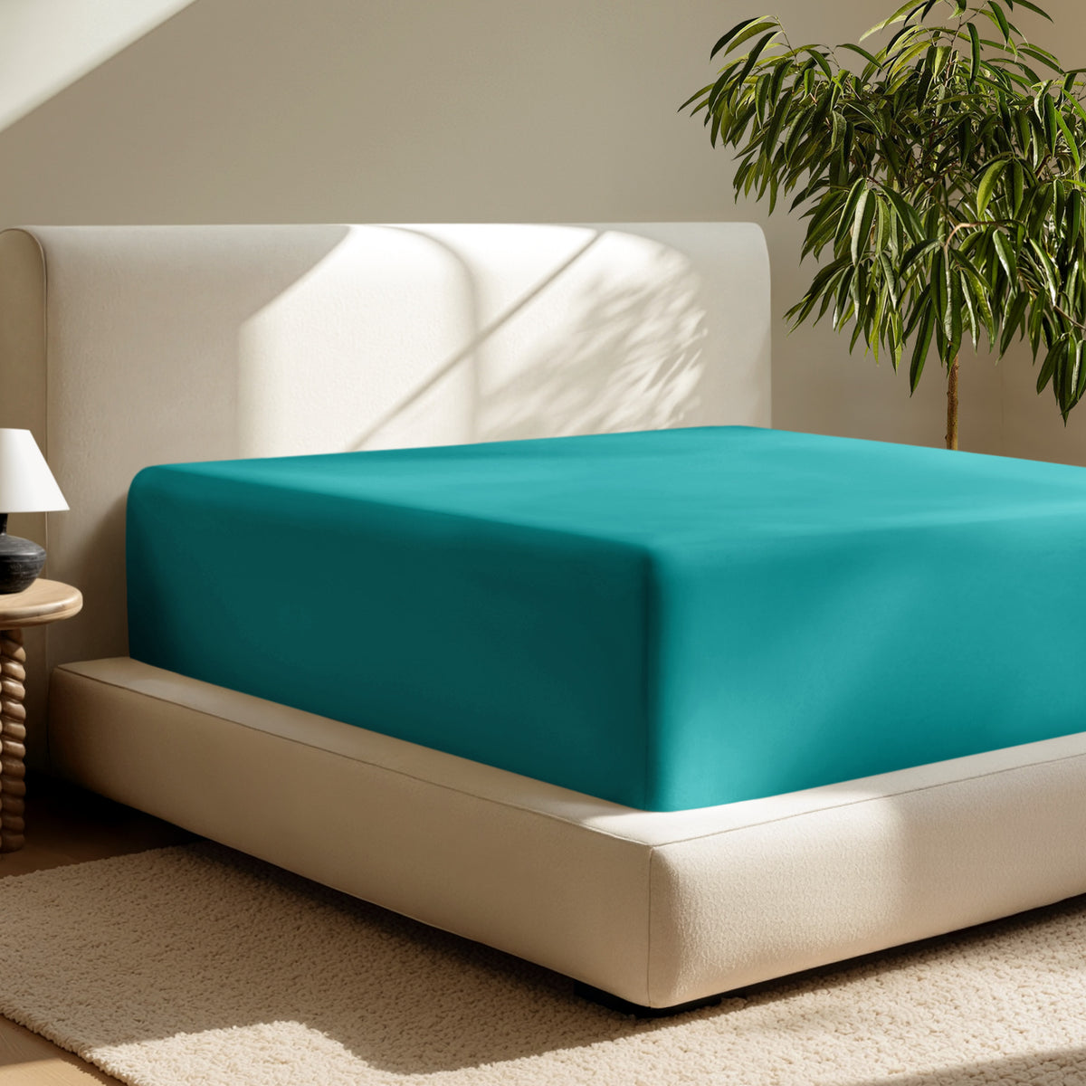 A deep pocket fitted sheet on a mattress