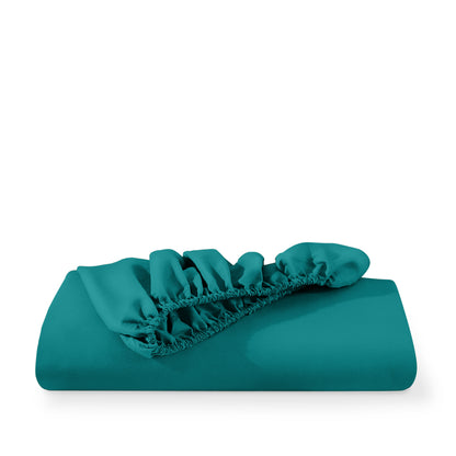 Microfiber fitted sheet folded with a white background