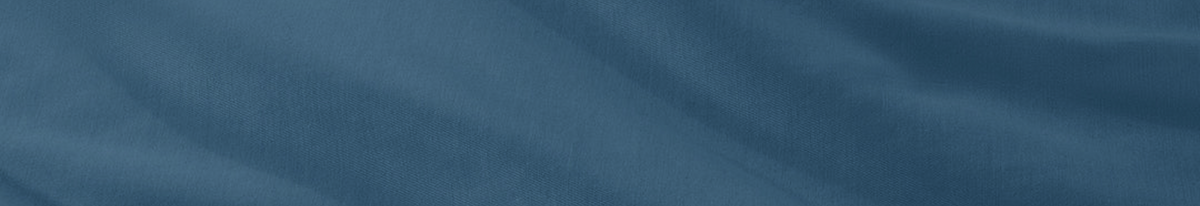 Close-up of a navy blue bedroom scene, collection banner