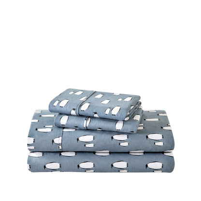 Stack of flannel sheets and pillowcases on a white background