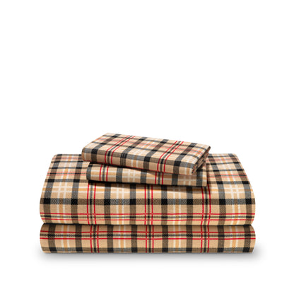 Stack of flannel sheets and pillowcases on a white background