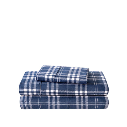 Stack of flannel sheets and pillowcases on a white background