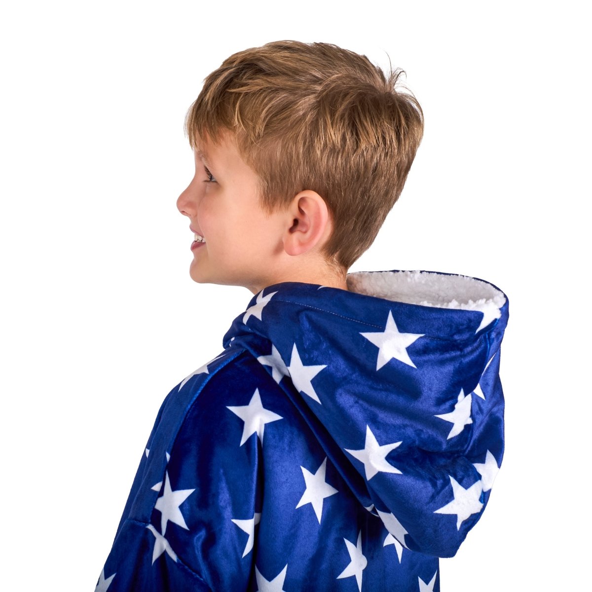 A child with a sherpa wearable blanket on
