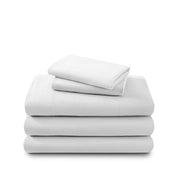 Cotton flannel sheet set folded and stacked on a white background