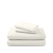 Cotton flannel sheet set folded and stacked on a white background