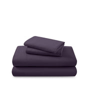 Cotton flannel sheet set folded and stacked on a white background