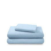 Cotton flannel sheet set folded and stacked on a white background