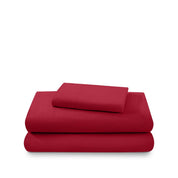 Cotton flannel sheet set folded and stacked on a white background