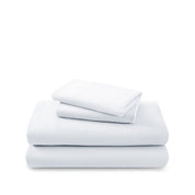 Cotton flannel sheet set folded and stacked on a white background