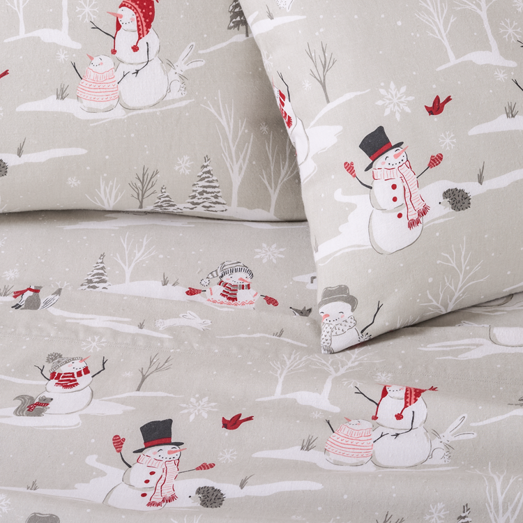 Sheet set with snowman design on a gray background